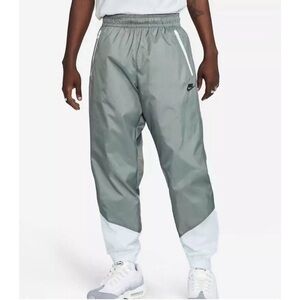 Nike Gray Windrunner Pants with Elastic Waistband and Tapered Fit